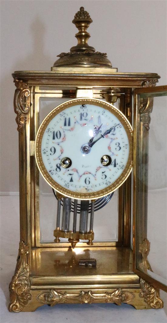 An early 20th century French ormolu four glass mantel clock, height 10in.